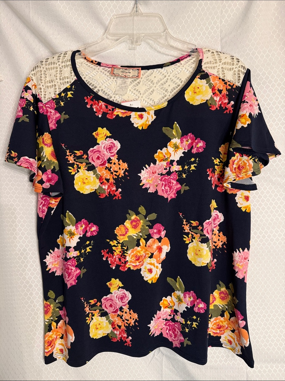 C’est la vie navy flowered blouse with lace on shoulders size large